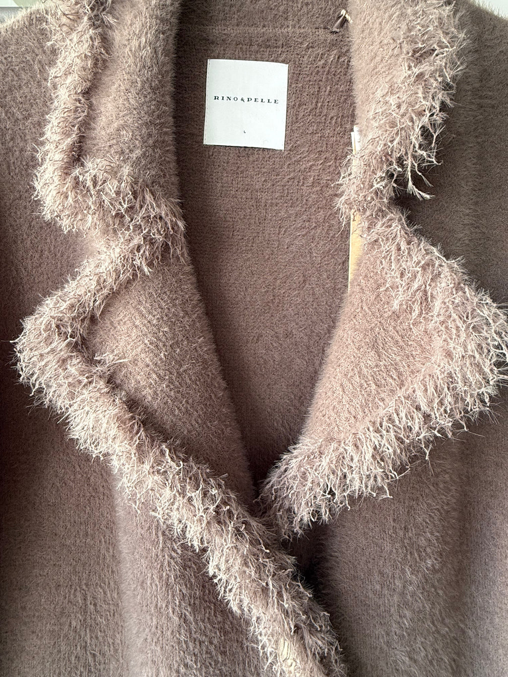 Single breasted cardigan with fringes