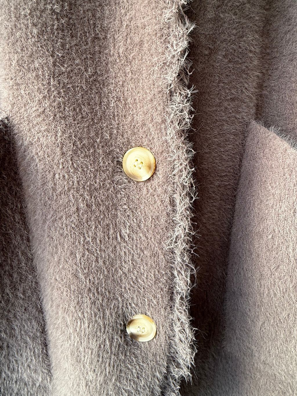 Single breasted cardigan with fringes