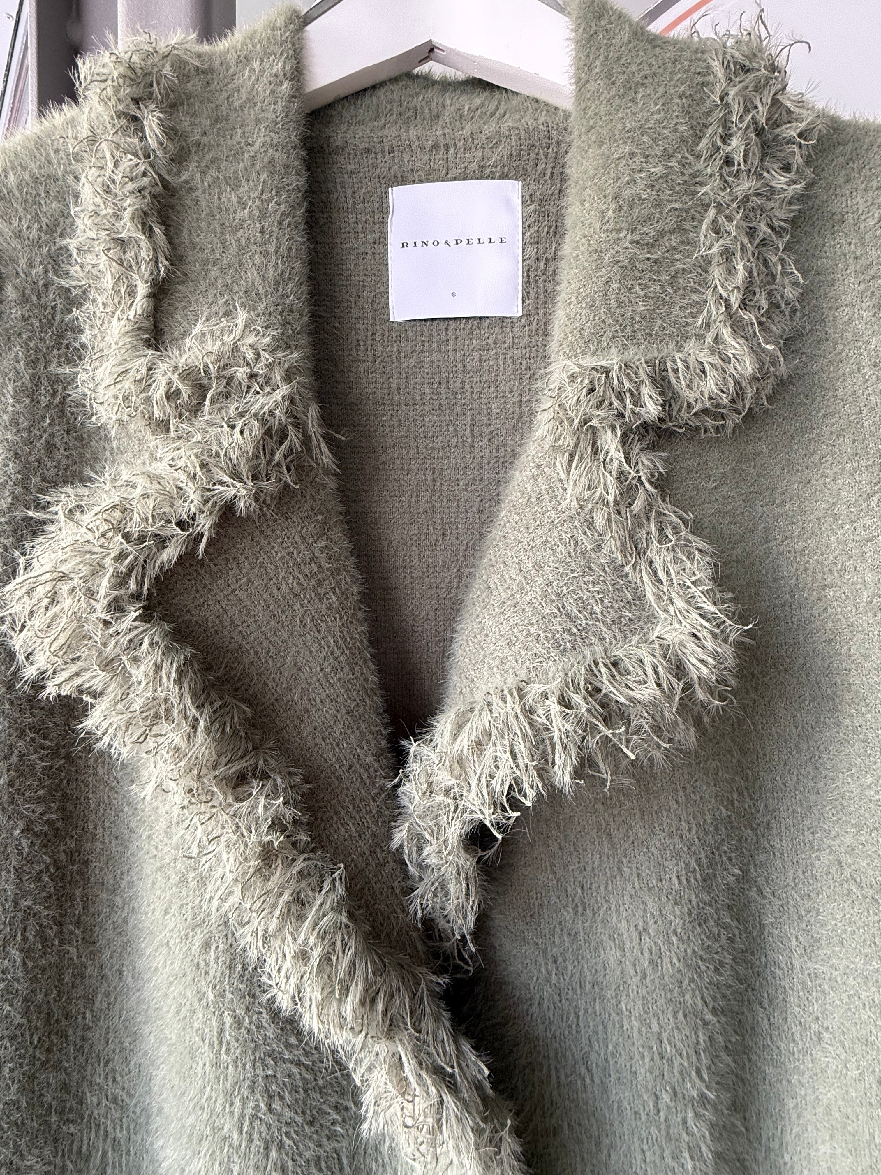 Single breasted cardigan with fringes