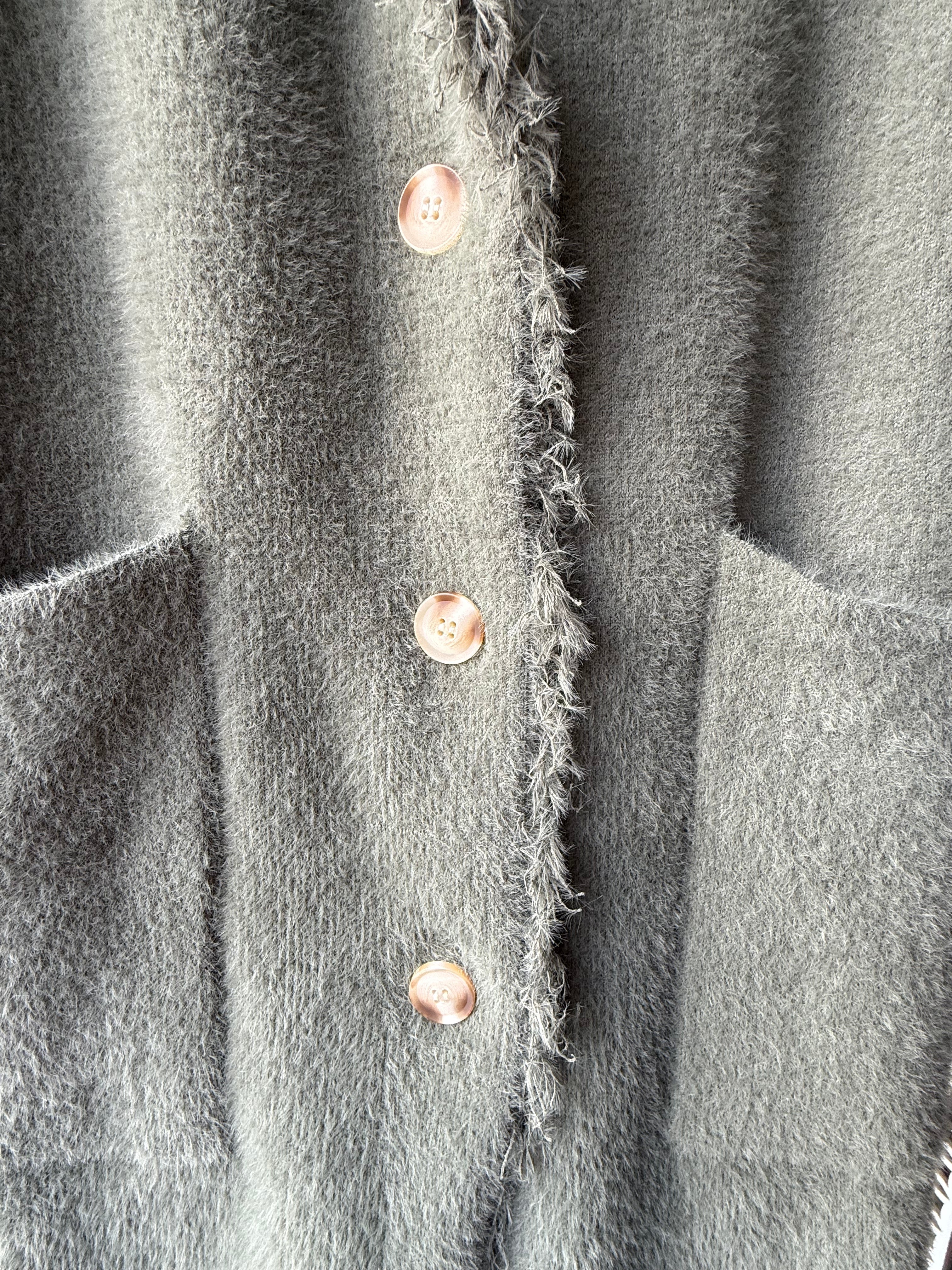 Single breasted cardigan with fringes