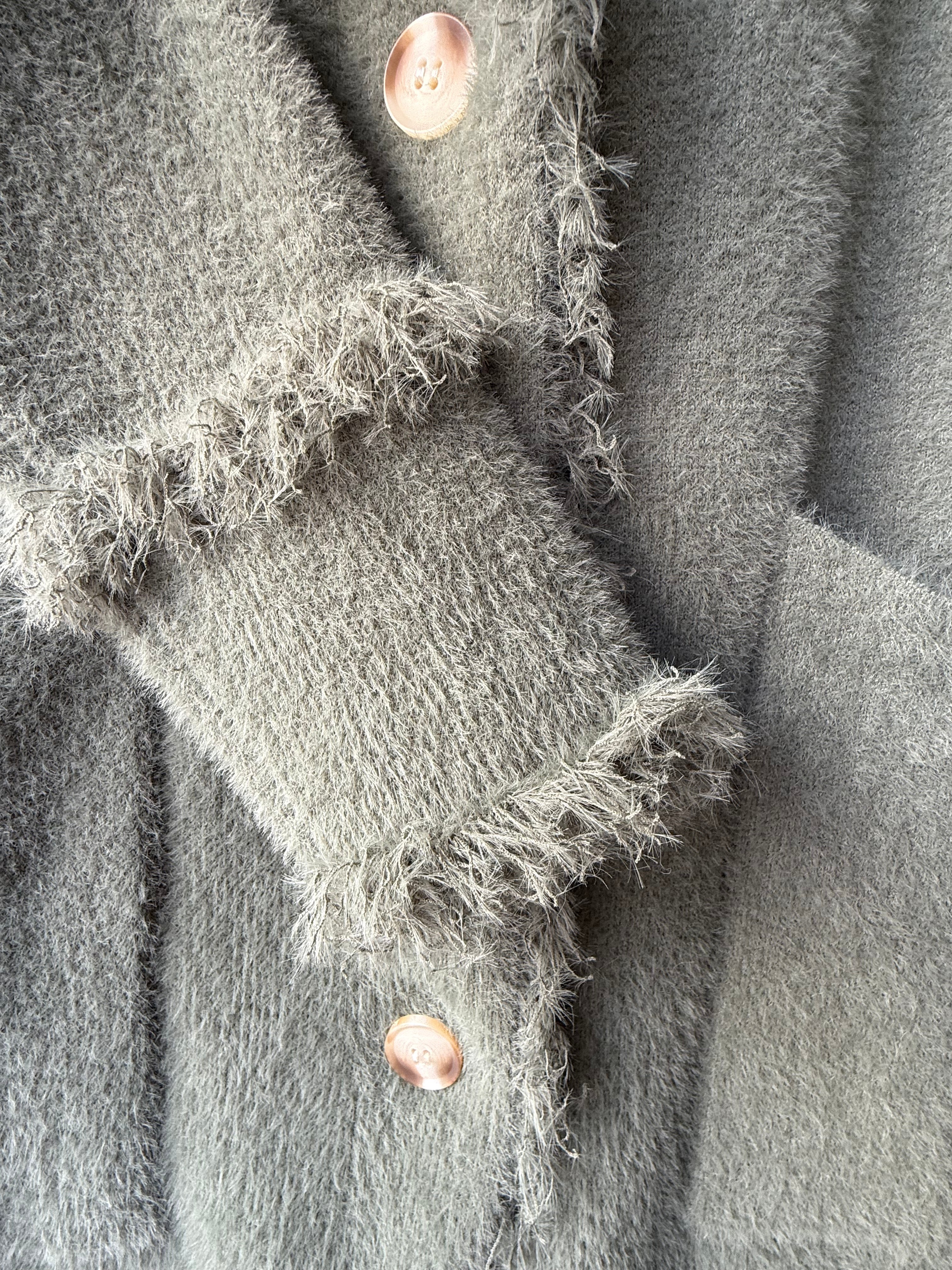 Single breasted cardigan with fringes