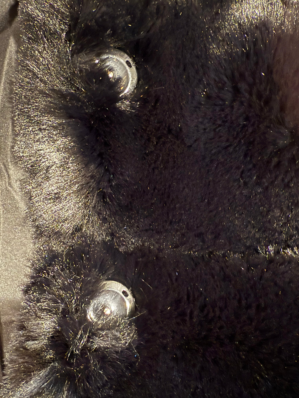 Faux fur jacket with knitted sleeves