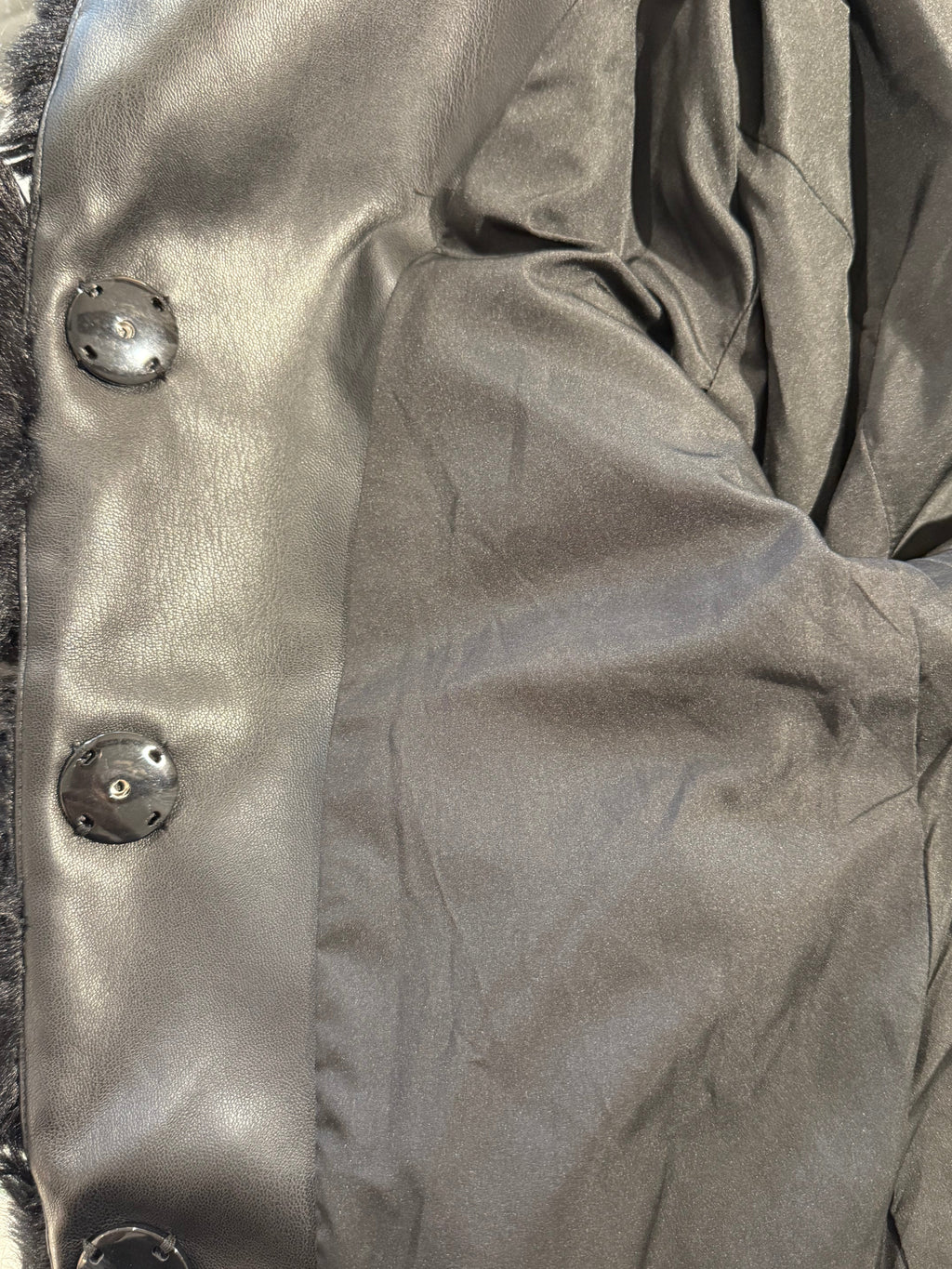 Faux fur jacket with knitted sleeves